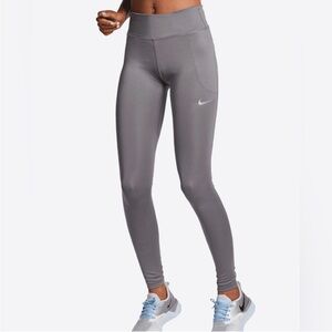 NWT Nike Women’s Mid Rise Fast Running Tights AT3103-509 Color Daybreak